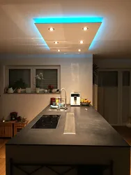 Suspended ceiling with lighting in the kitchen photo