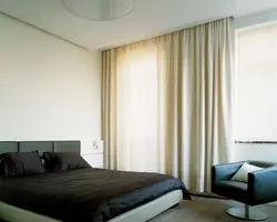 Wall cornice in the bedroom interior