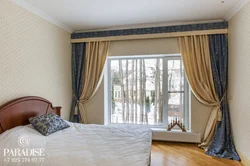 Wall cornice in the bedroom interior