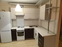 Kitchen design 8 sq.m. with refrigerator and washing machine