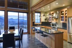 Kitchen design with panoramic windows in a modern style photo