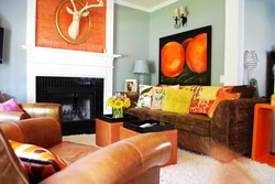 Orange sofa in the living room interior