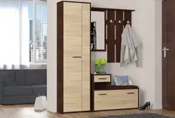 Hallways in the corridor with a mirror and a shoe rack and a wardrobe photo