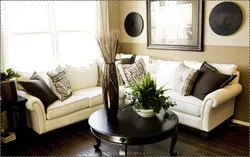 Different sofa and armchair in the living room interior