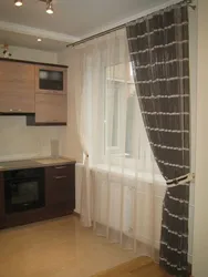 Hanging curtains in the kitchen photo