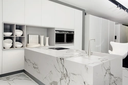 Kitchens with marble countertops and apron photo in the interior
