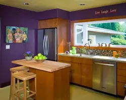 What kind of walls are in the kitchen photo