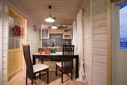 Wooden wall in the kitchen design photo