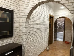 Bir mənzildə dekorativ kərpic arch