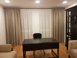 Window design in the living room curtains and tulle photo