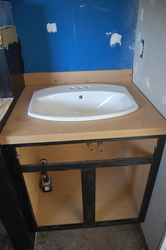 DIY bathroom vanity unit made of wood photo