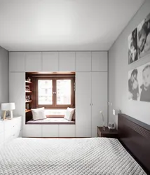 Bedroom design with one window opposite the door