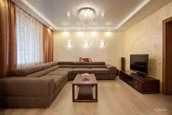 Wallpaper In The Interior Of The Living Room With Dark Furniture