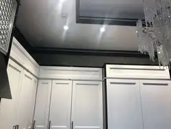 Gray ceiling in the kitchen interior