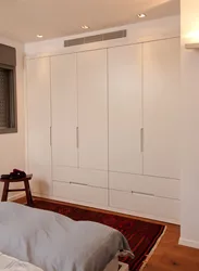Built-in wardrobes in the bedroom interior