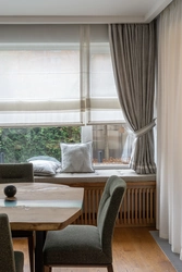 Short curtains in the living room interior photo