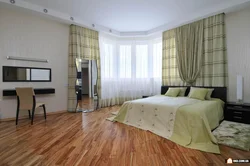 Bedroom Design In A Corner Room Photo