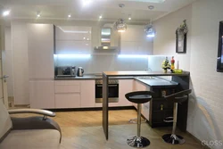 White kitchen design with breakfast bar