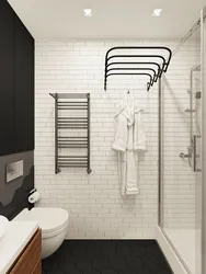 White Heated Towel Rail In The Bathroom Interior