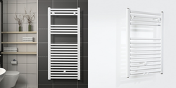 White heated towel rail in the bathroom interior