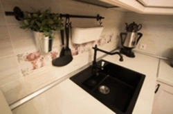Black roof rail for kitchen interior