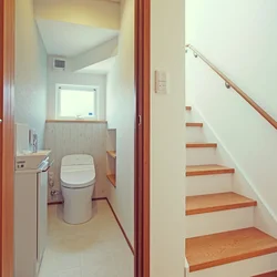 Bathroom under the stairs design