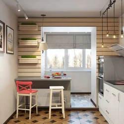 Photo of a square kitchen with a balcony