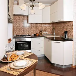 Corner kitchen units for a small kitchen with built-in appliances photo