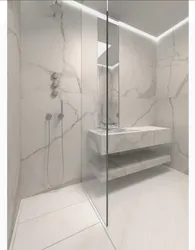 Bathroom design with shower and toilet in marble