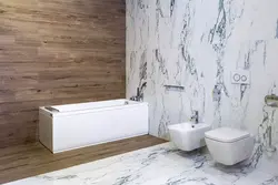 Vinyl tiles on the bathroom walls photo