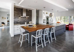 White interior kitchen with living room with porcelain stoneware