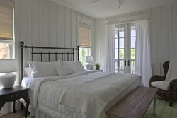 Interior of a wooden bedroom in light colors