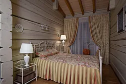 Photo of a bedroom in a wooden style photo