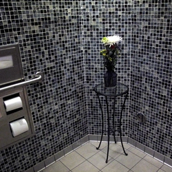 Black mosaic tiles in the bathroom photo