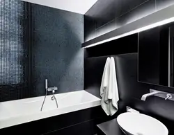 Black mosaic tiles in the bathroom photo