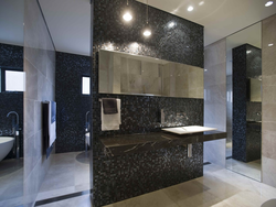 Black mosaic tiles in the bathroom photo