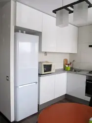 Small kitchen design with refrigerator photo