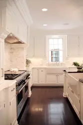 Dark Floors And Light Walls In The Kitchen Interior