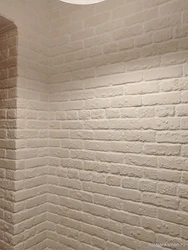 Plaster bricks in the hallway photo