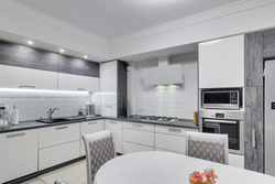 Kitchen design in gray and white tones in a modern style