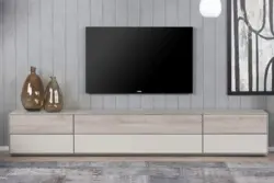 Televizor üçün qonaq otağında müasir üslubda çekmeceli sandıq şəkli