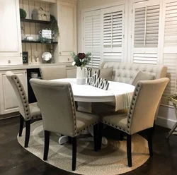 Round table and sofa in the kitchen photo