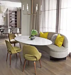 Round table and sofa in the kitchen photo