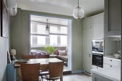 Kitchen interior with balcony and sofa photo