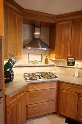 If the stove is in the corner of the kitchen photo