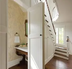 Home design bathroom under the stairs