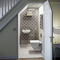 Home design bathroom under the stairs