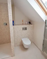 Home design bathroom under the stairs
