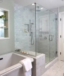 Bathtub and shower corner in one bathroom photo