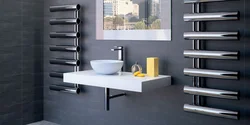 Black heated towel rail in the bathroom design